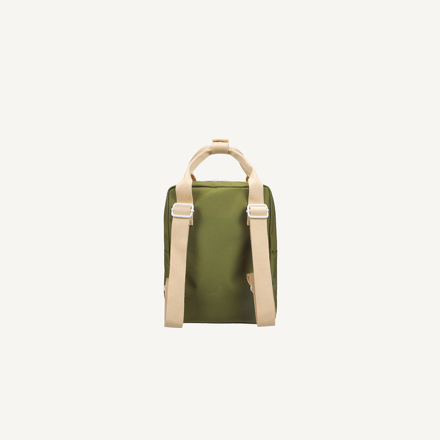 The Sticky Lemon Backpack Small - Envelope - Tickling Grass is a kids' olive green backpack made from recycled PET bottles, with beige adjustable straps and a top handle, shown from the back on a plain white background.
