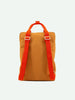 A Sticky Lemon Backpack Large in Farmhouse color with bold orange straps and recycled RPET buckle details, displayed against a plain white background.