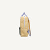 Side view of the Sticky Lemon Backpack Large - Envelope in Twiggy Beige, a light yellow kids' backpack with lavender handles and zippers, orange straps, mesh side pocket, made from recycled PET bottles on a plain white background.