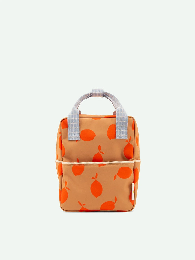 A Sticky Lemon Backpack Small | Farmhouse | Special Edition made from recycled PET bottles, featuring an orange and red apple print, a front zip pocket with a YKK zipper, and gray plaid short handles.