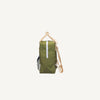 Side view of the Sticky Lemon Backpack Small - Envelope - Tickling Grass: green with tan handles/straps, front zipper, small checkered side pocket, made from recycled PET bottles, shown on a plain white background.