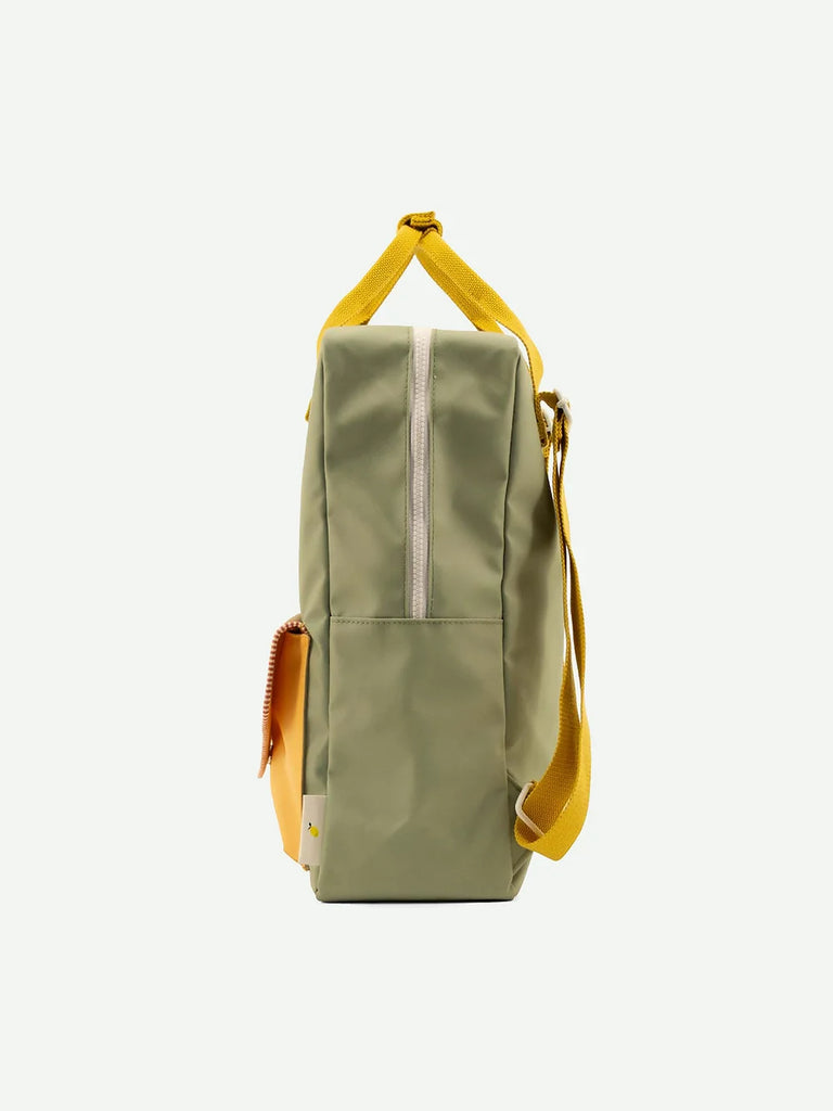 A stylish Sticky Lemon Backpack Large in Map Green made from waterproof nylon with a yellow top handle and straps, featuring a front zip compartment and brown leather accents, isolated on a white background.