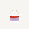 The Sticky Lemon Treasure Bag - Dewy Lilac is a small rectangular PU leather bag with a pale purple body, red top edge, yellow handle, and textured red interior, shown on a plain white background.