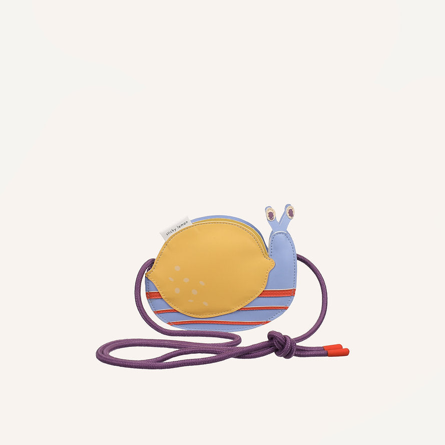 The Sticky Lemon Wallet Bag - Snail is a small, snail-shaped PU leather bag for kids, featuring a yellow shell, blue and red striped body, purple strap with a red tip, and tiny snail eyes on top from the Once upon a lemon tree collection.