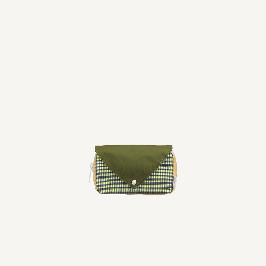 The Sticky Lemon Fanny Pack Small - Envelope - Tickling Grass features a green flap, snap button closure, and green and white checkered front. This beige-sided pouch has a waterproof recycled PET lining and is shown on an off-white background.