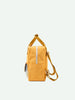 A bright yellow Sticky Lemon backpack with a YKK zipper closure and adjustable strap, displayed against a neutral background.
