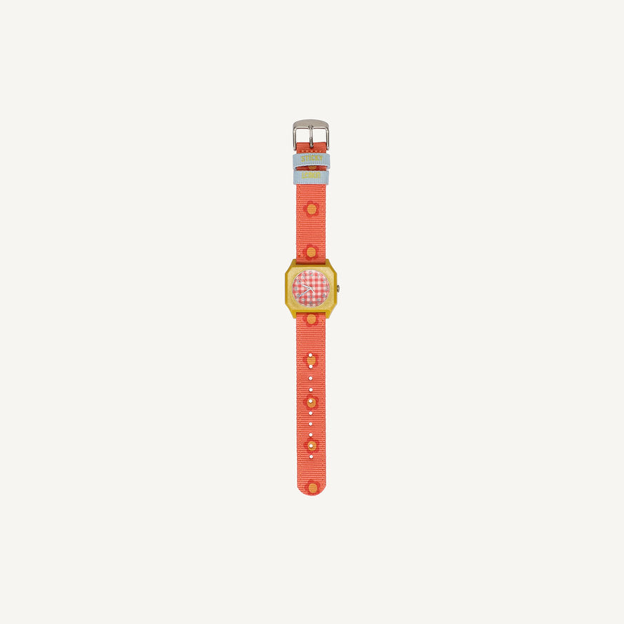 The Sticky Lemon x Mini Kyomo Watch - Flower features a bright red-orange strap, yellow case, and a checkered pink and white face, shown on a plain white background.