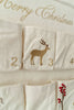 A close-up of the Sabo Concept Christmas Cotton Advent Calendar shows numbered pockets; pocket 3 has a reindeer, and "Merry Christmas" is partially visible at the top.