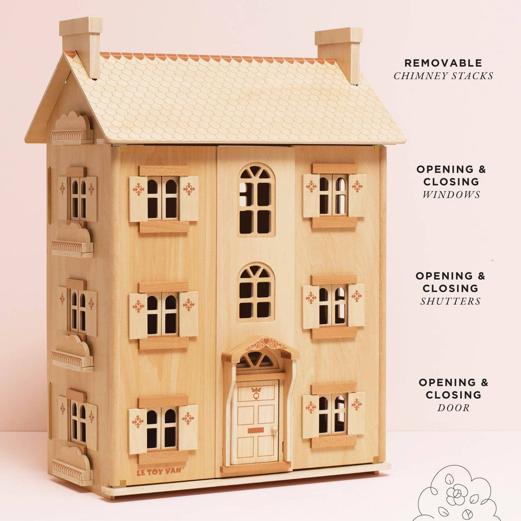 The Grand Natural Wood Doll House features detailed windows, shutters, and a door. Crafted from sustainable wood, it includes removable chimneys and opening windows for imaginative play. Light wood with decorative trim adds charm.