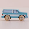 The No. 31 GT170 Chuck, made in England, is a blue and white wooden SUV toy with round wooden wheels, set on a light surface against a light background—perfect for inspiring off-road journeys and imaginative adventure toy play.