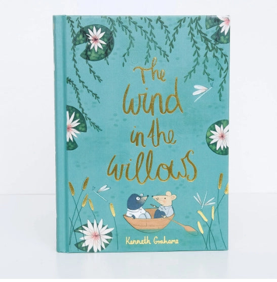 The Collector's Edition of "The Wind in the Willows" features a teal hardcover with enchanting illustrations of a mole and mouse sailing among water lilies and willow branches.