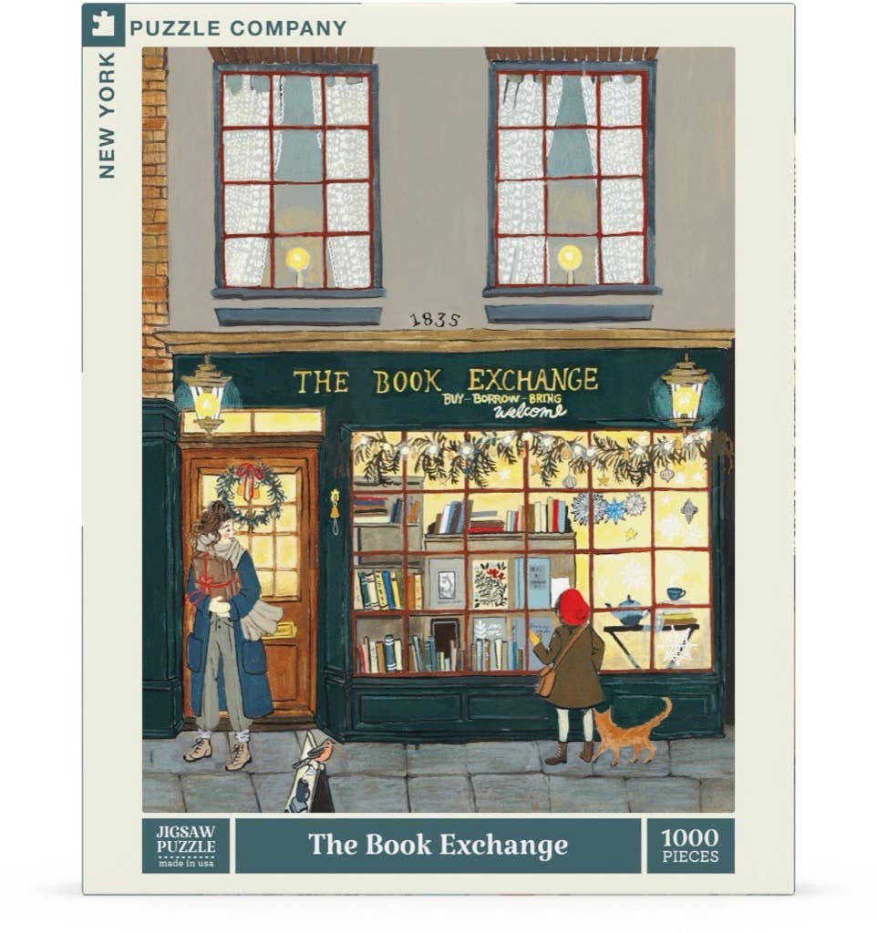 Illustration of The Book Exchange bookshop with a festive cat, a man in blue holding books, and a girl in a red scarf—The Book Exchange - 1000 Piece Jigsaw Puzzle makes a perfect gift for book lovers.