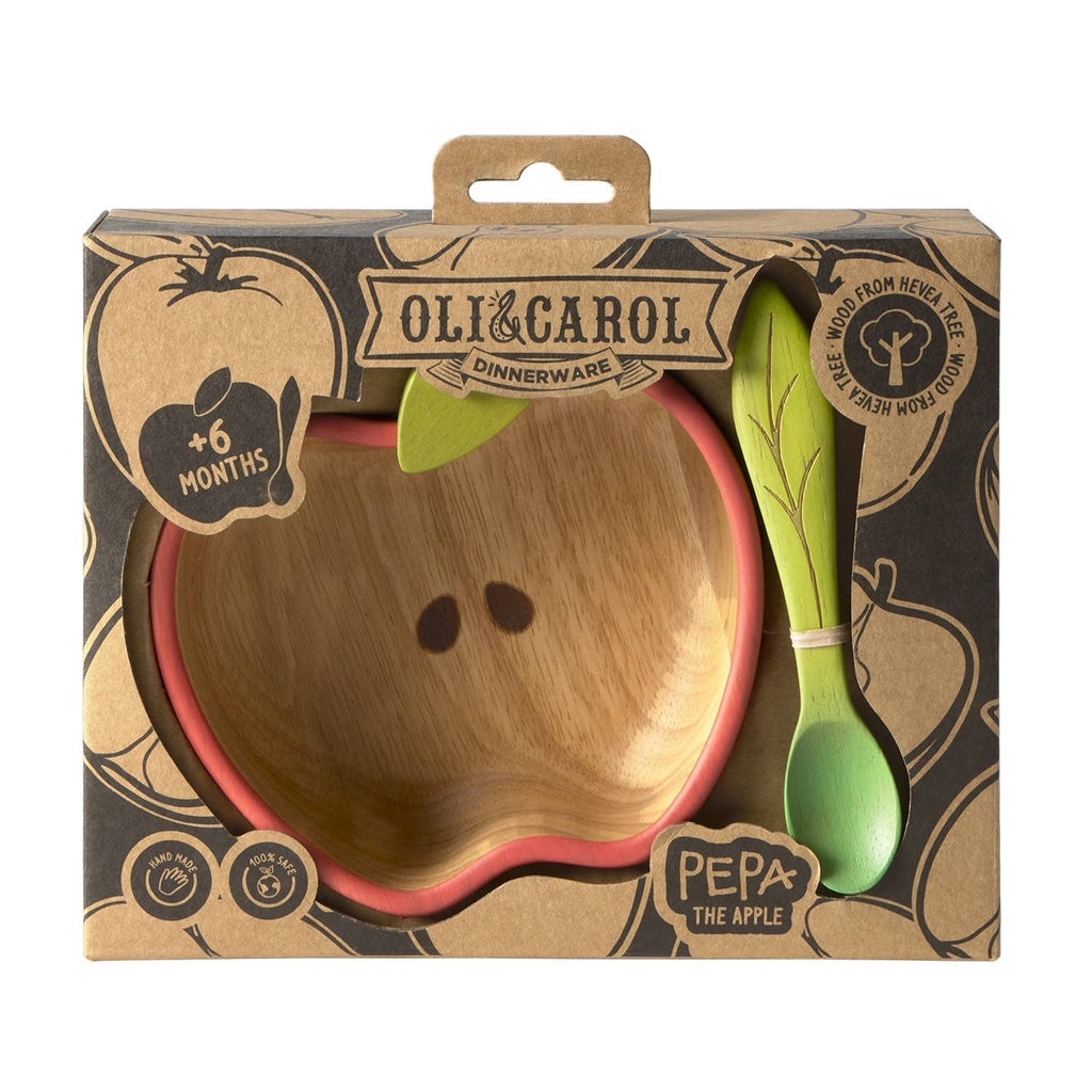 The Pepa the Apple Bowl & Spoon Set is a non-toxic, apple-shaped bamboo baby dinnerware set with a red rim, green leaf detail, and green spoon. Packaged in an "Oli&Carol Dinnerware" box for ages 6 months and up.