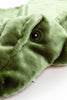 A close-up of a plush green crocodile toy with a shiny black eye and soft faux fur—perfect for pairing with the Costume - T-Rex Dino.