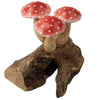 The Small Wooden Red Mushroom Trio features three red and white spotted mushrooms with beige stems, artfully attached to a textured brown driftwood base to create a whimsical woodland scene. This charming figurine adds the enchanting appeal of wooden red mushrooms to your home décor.