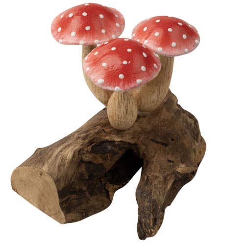 The Small Wooden Red Mushroom Trio features three red and white spotted mushrooms with beige stems, artfully attached to a textured brown driftwood base to create a whimsical woodland scene. This charming figurine adds the enchanting appeal of wooden red mushrooms to your home décor.