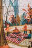 Enjoy assembling Secrets of the Autumn Woods 300 Piece Puzzle, featuring an illustration of three people picnicking on a red checkered blanket in an autumn forest. Includes jigsaw pieces and a large reference poster for easy assembly.