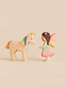 Handmade Holzwald Fairy Tale Set featuring a fairy with pink wings and a unicorn with a rainbow mane and tail facing each other.
