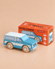 A blue and white wooden SUV toy car sits next to its orange box labeled “No. 31 GT170 Chuck | Made in England,” featuring illustrations and product details—perfect for inspiring imaginative adventures and off-road journeys.
