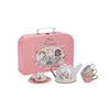 A pink Moulin Roty Metal Tea Party Suitcase Set - The Parisiennes toy suitcase features an illustration of three girls, accompanied by a metal tea set with a teapot, a saucer, and three stacked teacups.