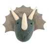 A handcrafted Felt Triceratops Wall Decor - Mini, designed to resemble a triceratops, with a teal textured fabric body and a light grey frill adorned with white horns and black stitched eyes.