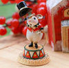 The Wee Forest Folk Tiny Collectible - Gold Rings (Not a Toy) features a hand-sculpted mouse figurine dressed as a circus ringmaster with a red jacket, black top hat, gold hoop, and festive details on a decorated platform.