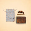 A Fox Cake Topper from Camp Hollow is arranged neatly on a light beige background.