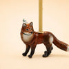 Handcrafted Fox Cake Topper displayed on a beige surface, featuring space for a small candle—an endearing collectible that brings charm to any keepsake collection.