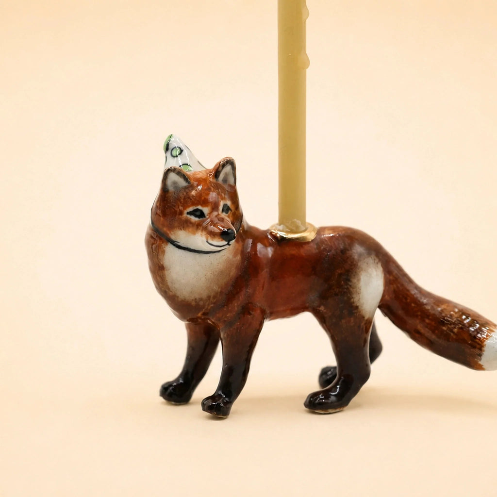 Handcrafted Fox Cake Topper displayed on a beige surface, featuring space for a small candle—an endearing collectible that brings charm to any keepsake collection.