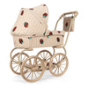 The Konges Sloejd Mini Doll Pram - Strawberry features vintage style, strawberry prints, a quilted cover, gold-tone metal frame, and large spoked wheels. It is photographed against a white background.