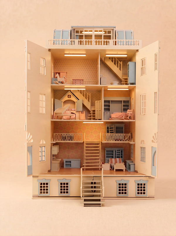 Introducing the "Fully Furnished Dollhouse With Lights, House of New York – The Six-Storey Giant": a detailed, completely furnished dollhouse with six spacious floors, an open front design, and multiple beautifully decorated rooms—including bedrooms, a kitchen, and inviting living spaces—all set against a classic beige background. Inspired by New York-style homes for a contemporary flair, this giant dollhouse provides modern elegance in every corner.