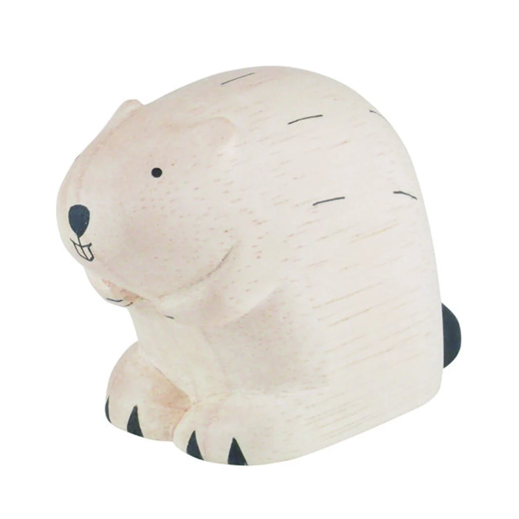 A Handmade Wooden Beaver, painted in light beige with black strokes to represent fur, featuring a small black nose and little black eyes.