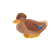 A small handcrafted Ostheimer Duck - Sitting figurine with a brown body, yellow beak, and a blue detail on its wing, set against a plain white background.