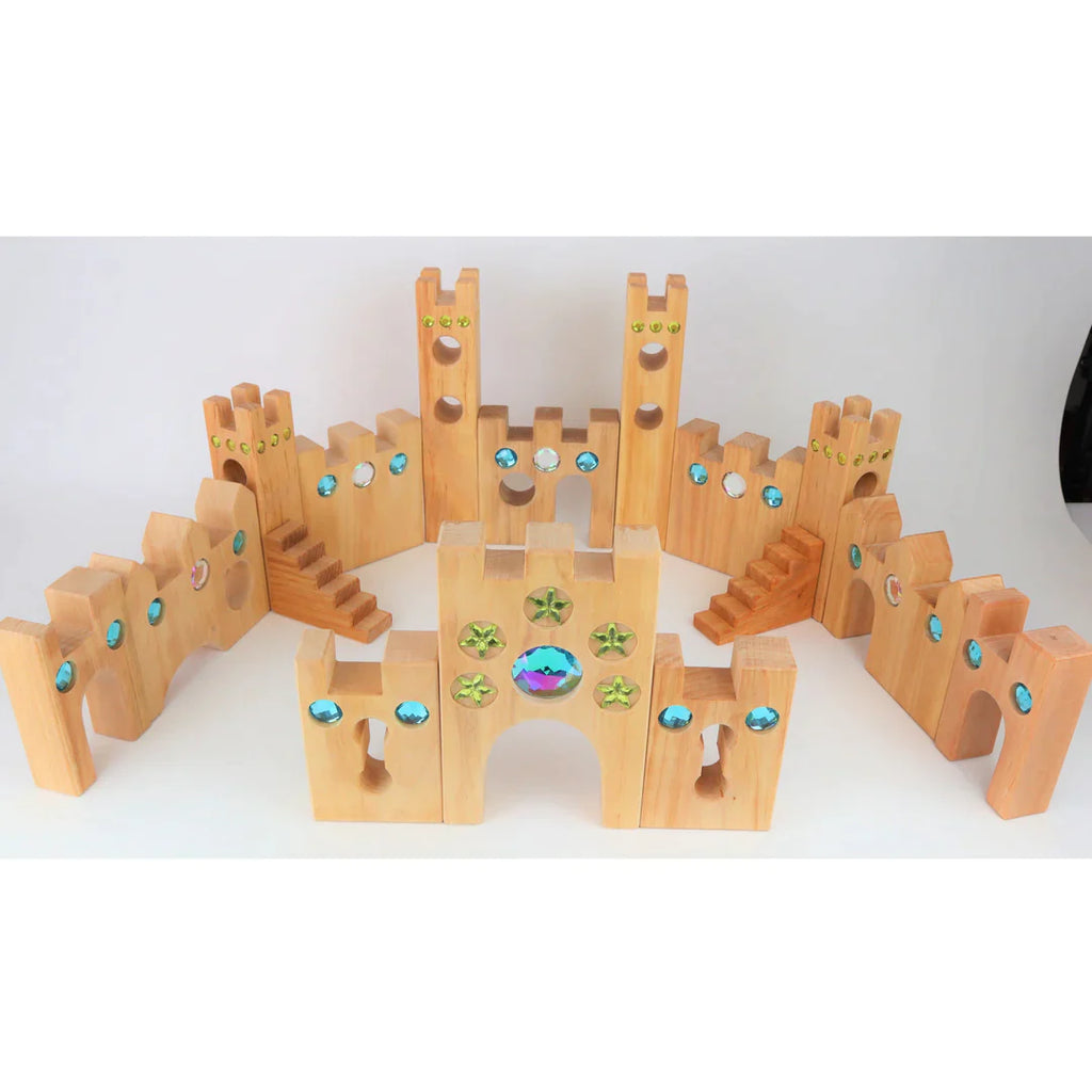 Wooden castle toy with gem inserts