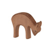 A wooden figurine of a simple, stylized Ostheimer Deer - Eating, handcrafted from light brown wood with visible grains, standing against a plain white background.