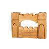 Wooden toy Ostheimer Gateway - Set With 2 Towers made of blocks assembled to form a gate and two towers, isolated on a white background. This handcrafted wooden toy is perfect for creative play.