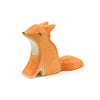 A Ostheimer Small Fox - Sitting figurine with a simple, stylized design, handcrafted in orange with visible wood grain, sitting upright on a white background.