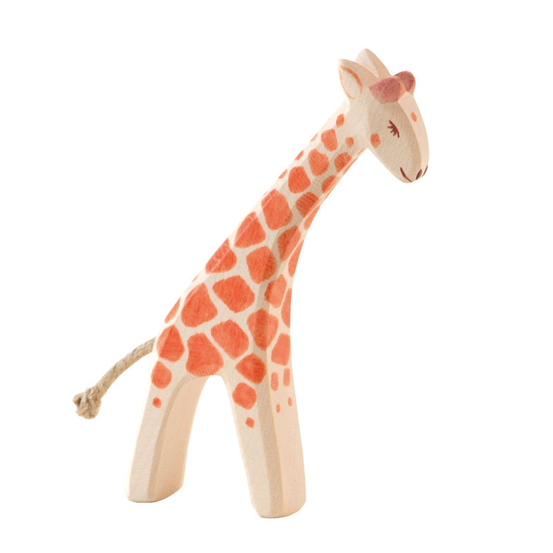 An Ostheimer Small Giraffe - Head Low with a smiling face, featuring prominent orange spots and a tail made from string, isolated on a white background.