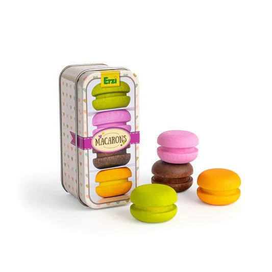 The Erzi Macarons In A Tin Pretend Food set includes a tin labeled "Macarons" and four colorful wooden macarons (yellow, green, orange, and pink)—ideal for imaginative play in any toy kitchen.