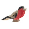 A Ostheimer Bullfinch figurine painted in shades of red, black, and beige, styled in a simplistic, artistic manner, representative of handcrafted wooden toys, isolated on a white background.