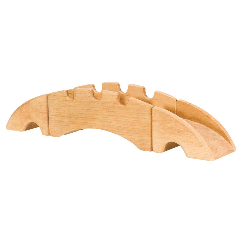 A wooden Ostheimer Bridge With 2 Ramps shaped like a stylized sports car, shown in profile on a plain white background. The car, handcrafted from sustainably sourced materials, has visible grain textures and smooth, curved