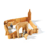 Wooden Ostheimer Castle with movable walls and towers, featuring small figurines, including a knight and a horse, set on a plain white background.