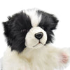 The Border Collie Dog Puppet features fluffy black and white fur, a black nose, and dark eyes, facing slightly to the left on a white background—perfect for collectors who love realistic stuffed animals.