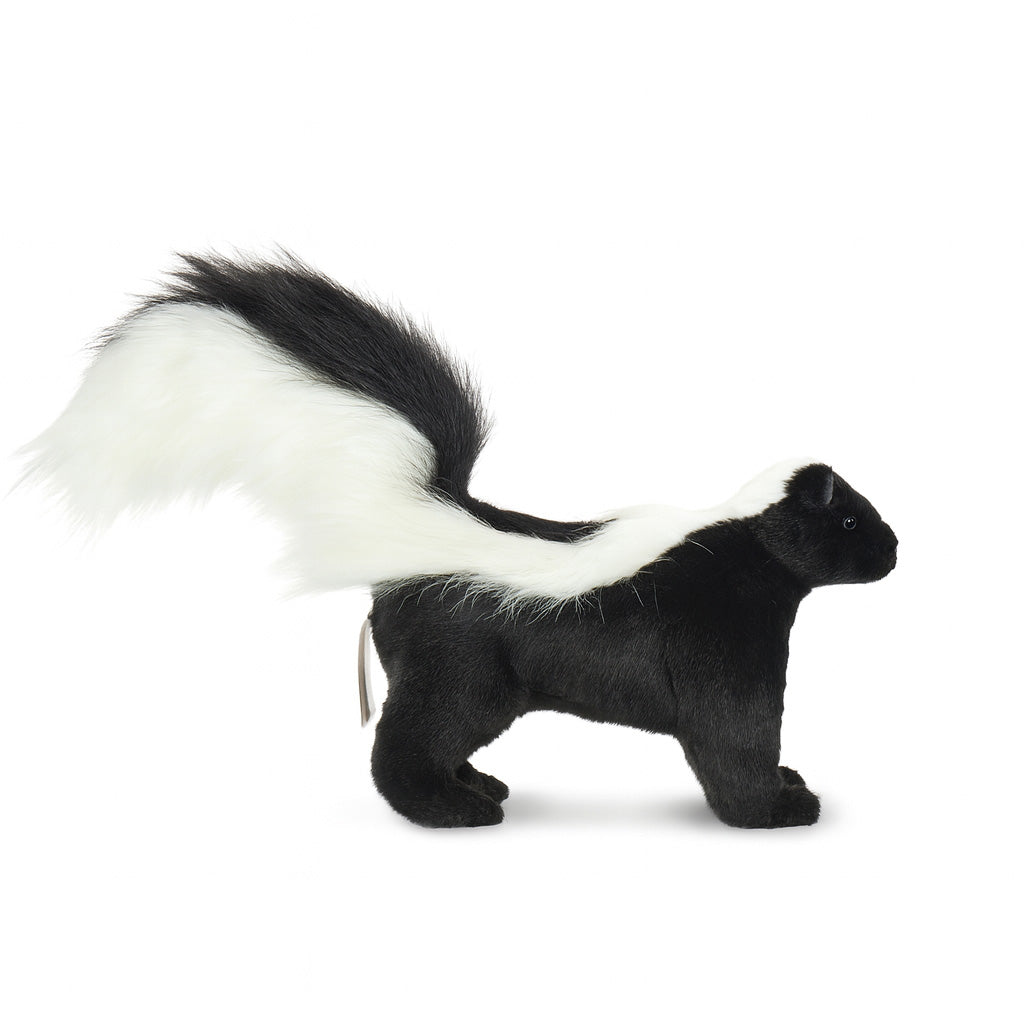The Skunk Stuffed Animal features soft black fur, a white stripe from head to bushy tail, and black feet, standing on all fours—perfect for anyone who loves realistic plush toys.
