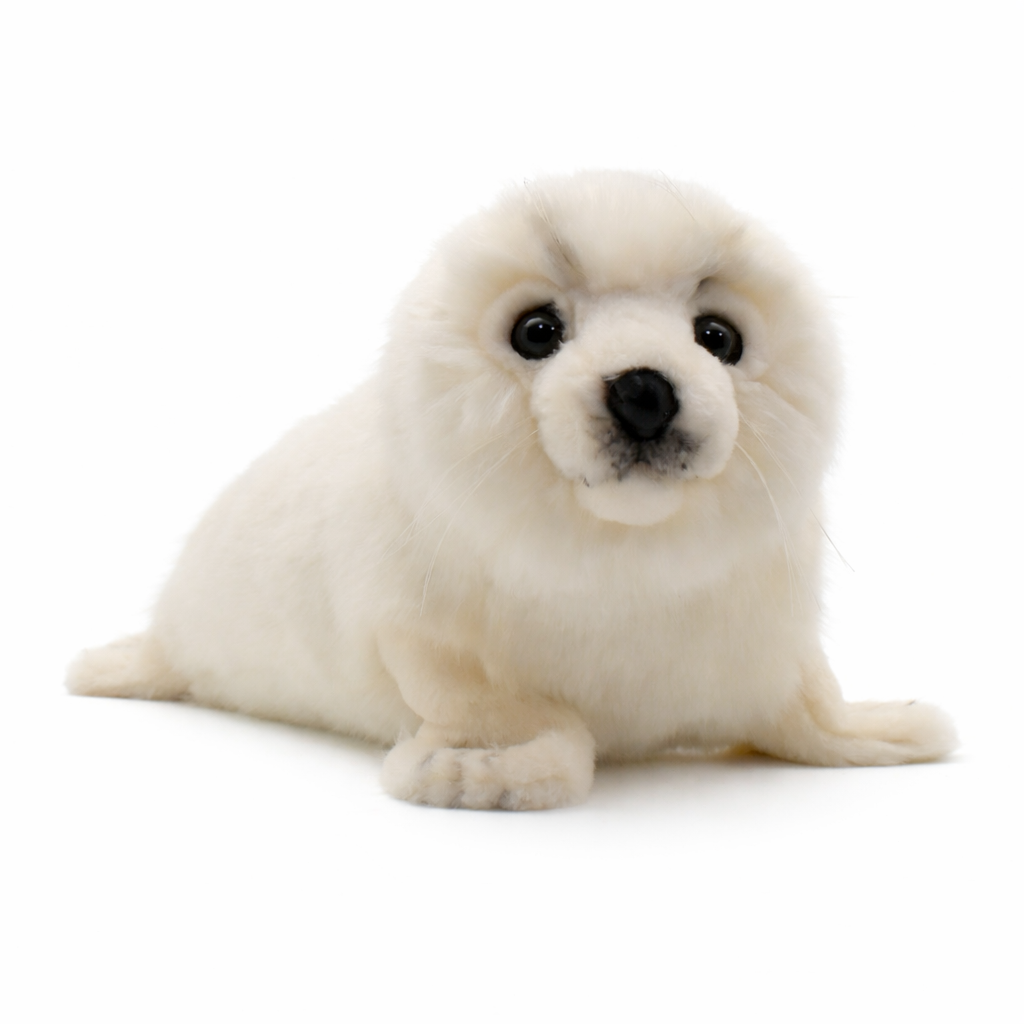 Realistic White Seal Stuffed Animal with a white coat and dark eyes.