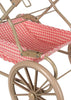 Close-up of the Konges Sloejd Doll Pram - Bubblegum Check, featuring a tan frame with large wheels and a red-and-white checkered fabric basket underneath.