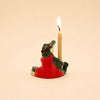 The Later Gator Cake Topper – Final Sale is a small, hand-painted ceramic alligator figurine in a red outfit, balancing a lit candle on its back against a plain light background, making it an adorable birthday decoration and charming collectible keepsake.
