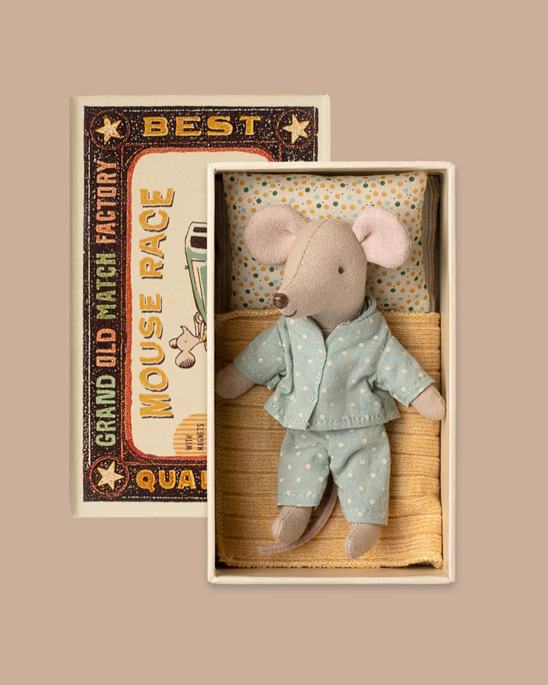 PRE-ORDER: Little Brother Mouse in Matchbox features a small mouse in blue polka-dot pajamas resting on soft bedding inside a vintage-inspired matchbox-style bed. Estimated ship date: early November.