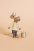 The Maileg Kitchen Set with Chef Mouse features a plush mouse chef in a white jacket, checked pants, and chef’s hat, standing by the kitchen set with a silver pot and wooden spoon on a neutral background.