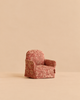 Maileg Grandma’s Hug miniature armchair in a pink floral pattern.